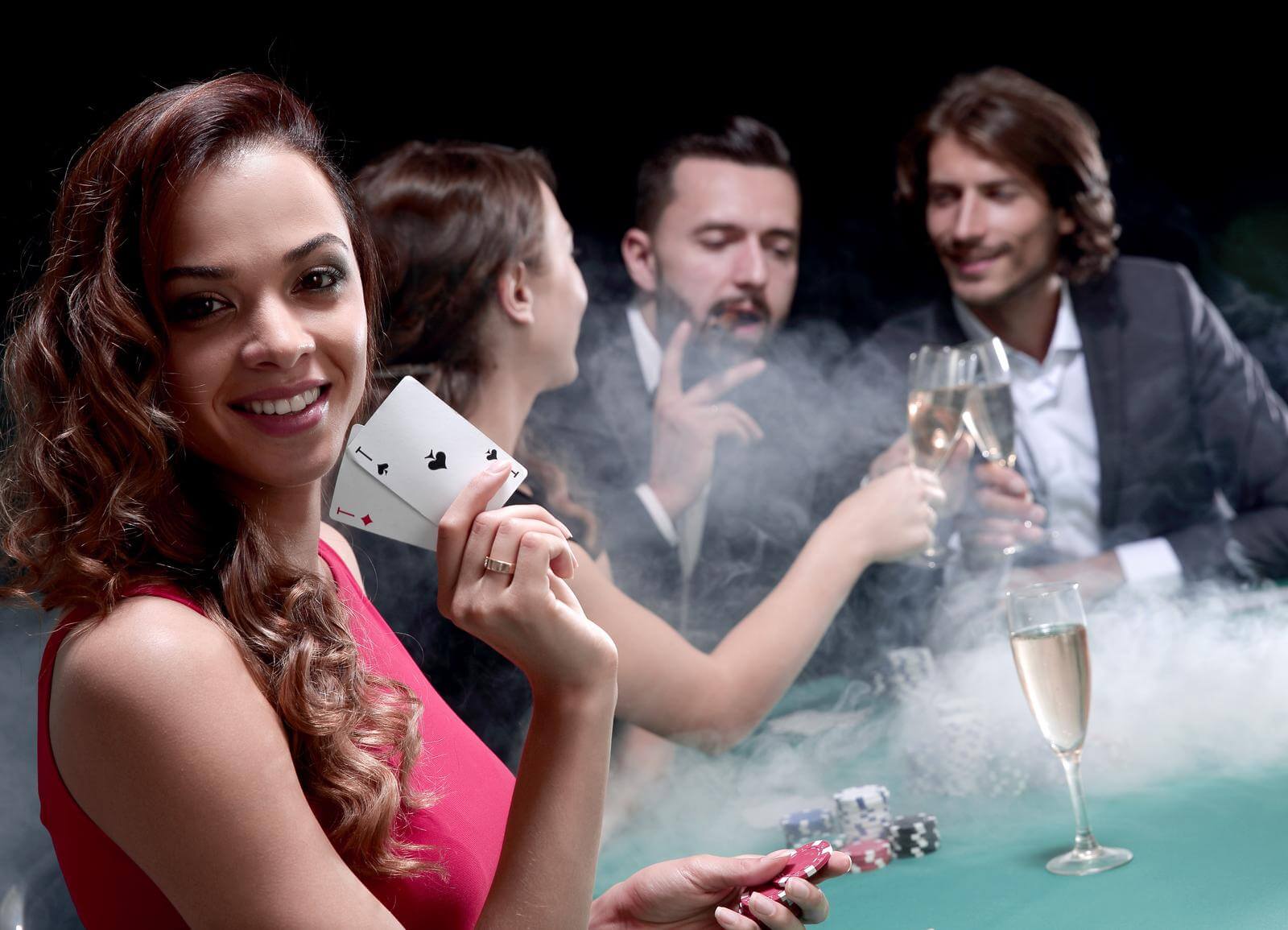 Group of friends playing blackjack, girl wins